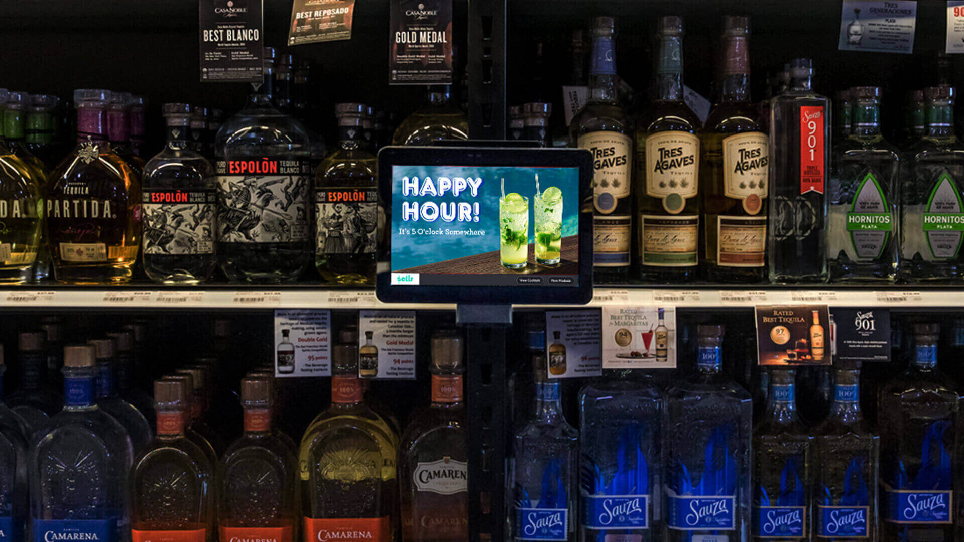 Liquor store point-of-purchase DOOH screen on shelves