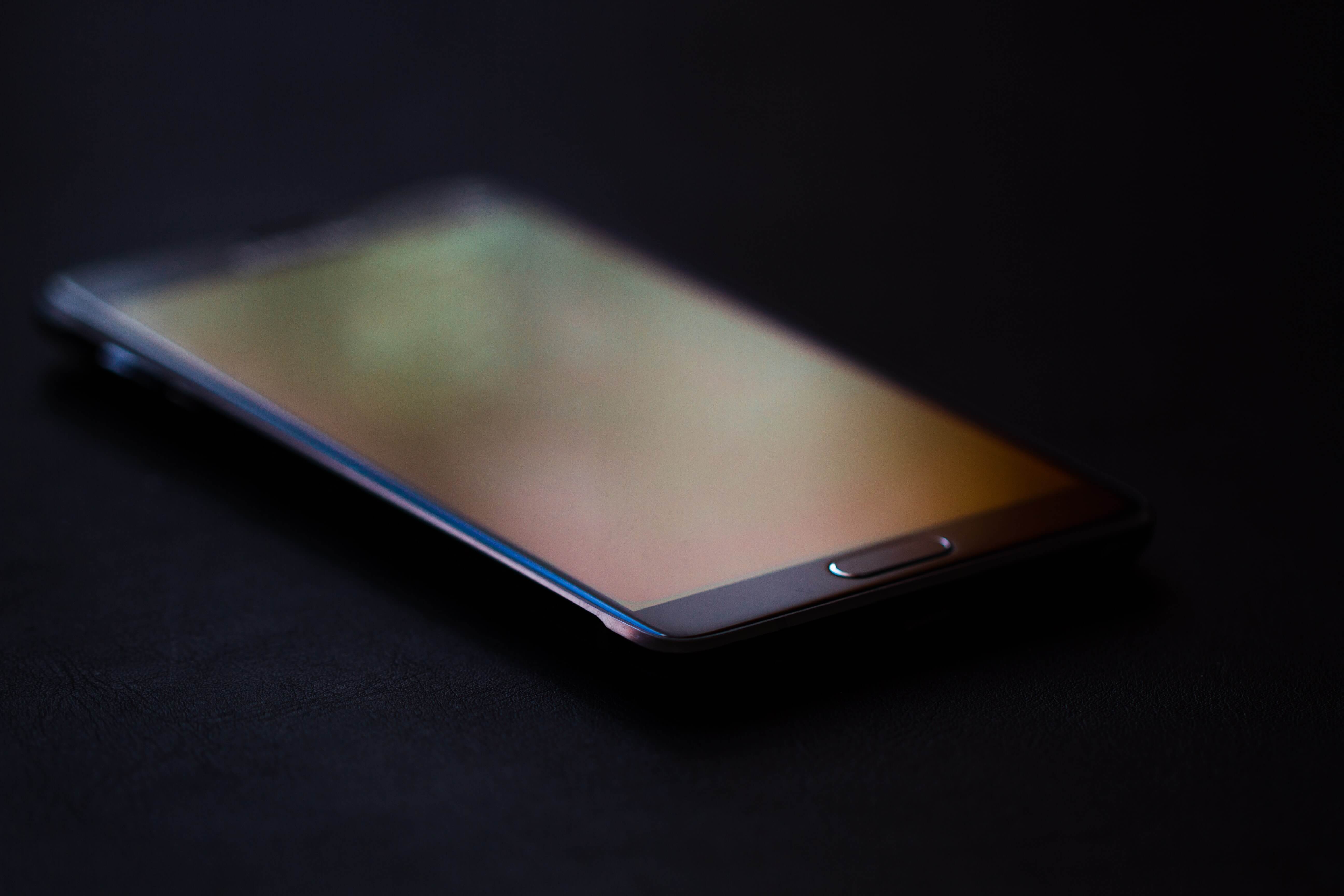 A Samsung phone in a dark background